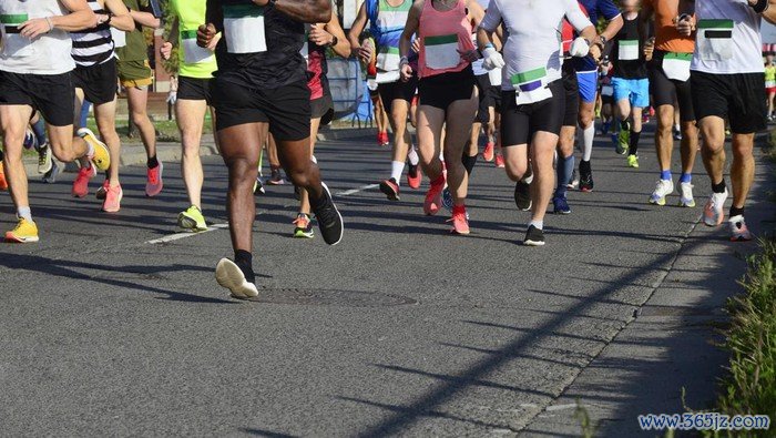 Lady and gent runners competing on the streets of Budapest, Hungary.